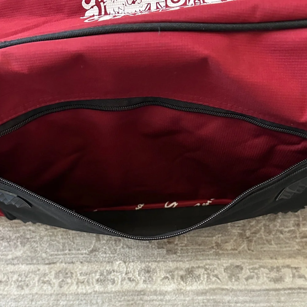 Ben Sherman Burgundy Duffel Bag with Black Accents.